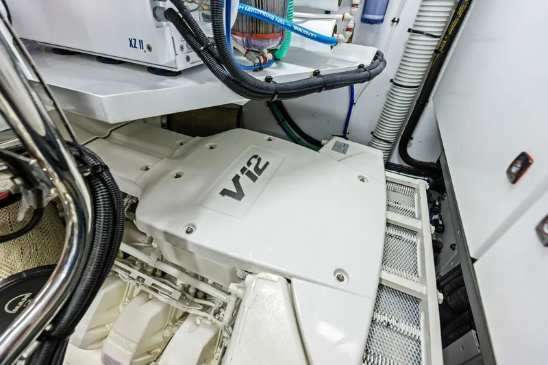 Slide: The Image of Engine room of 2024 Princess X80 yacht featuring a V12 engine. - 137