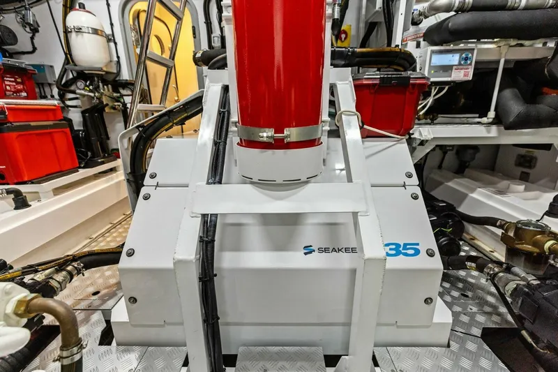 Slide: The Image of Engine room of 2024 Princess X80 yacht featuring Seakeeper 35 stabilizer system. - 140
