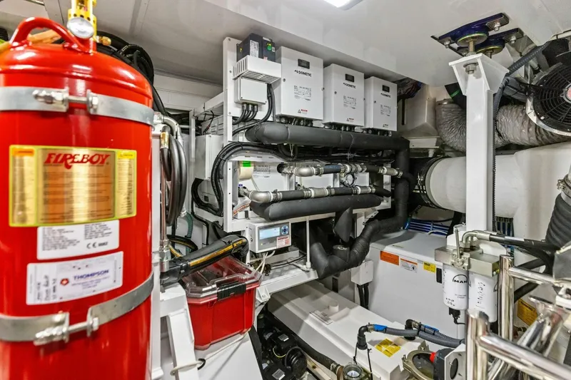Slide: The Image of Engine room of 2024 Princess X80 yacht with fire suppression system and advanced machinery. - 141