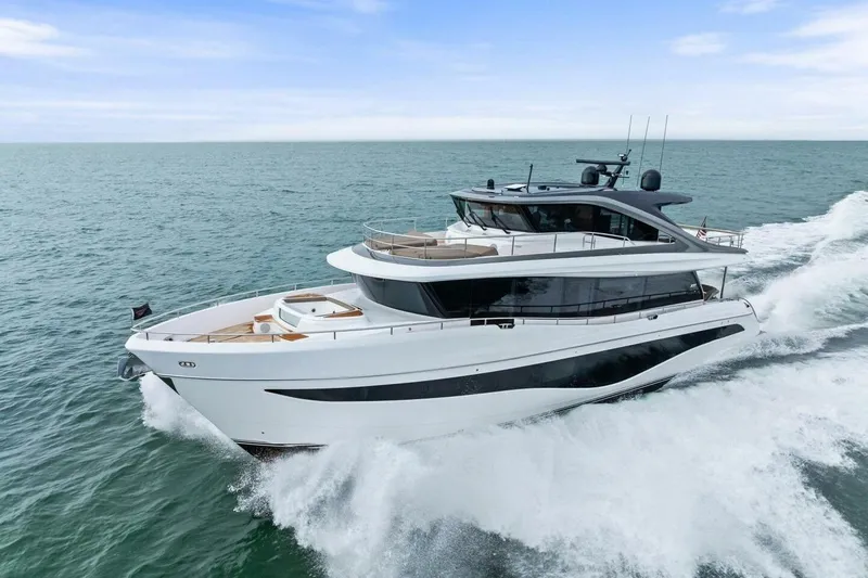 Slide: The Image of Luxurious 2024 Princess X80 yacht cruising on open sea, showcasing sleek design and elegance. - 146
