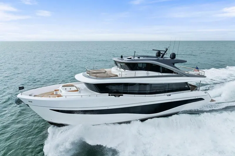 Slide: The Image of 2024 Princess X80 yacht cruising on open sea under clear blue sky. - 147