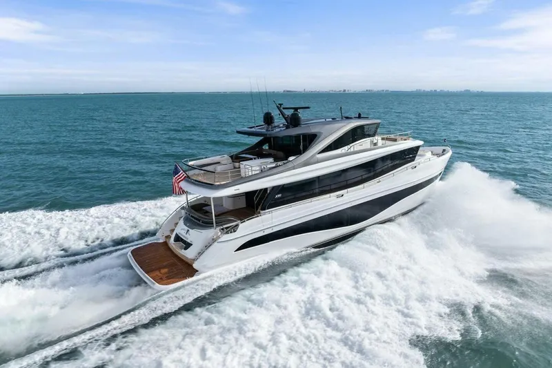 Slide: The Image of 2024 Princess X80 yacht cruising on open sea, showcasing sleek design and luxury features. - 156