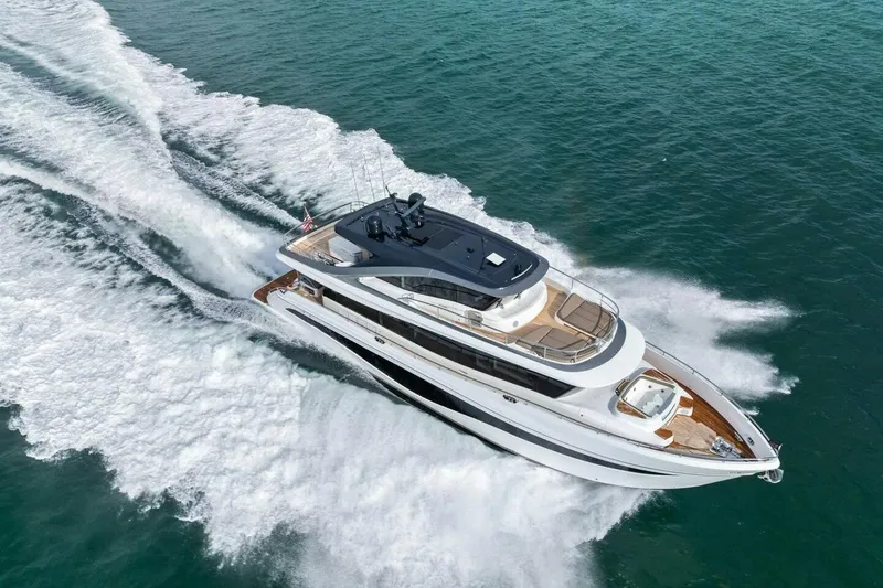 Slide: The Image of 2024 Princess X80 yacht cruising on open water, showcasing luxury and speed. - 158