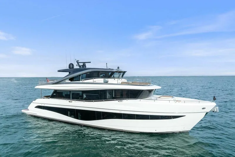 Slide: The Image of 2024 Princess X80 yacht cruising on open sea under clear blue sky. - 162