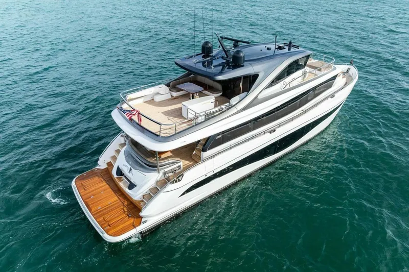 Slide: The Image of Luxurious 2024 Princess X80 yacht cruising on open water, showcasing elegant design and spacious deck. - 165
