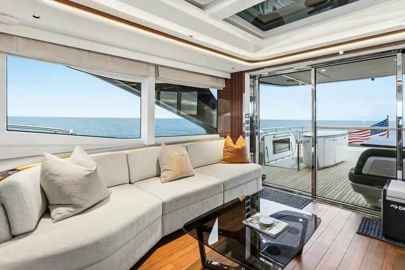 Slide: The Image of Luxurious 2024 Princess X80 yacht interior with ocean view and elegant seating area. - 18