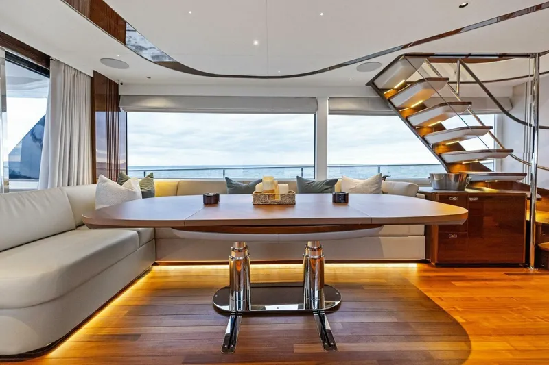 Slide: The Image of Luxurious interior of 2024 Princess X80 yacht with elegant seating and modern staircase. - 28