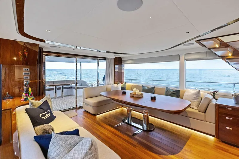 Slide: The Image of Luxurious interior of 2024 Princess X80 yacht with ocean view and elegant seating area. - 30