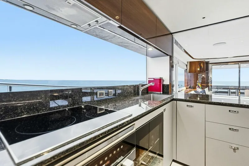 Slide: The Image of Luxurious kitchen interior of 2024 Princess X80 yacht with ocean view. - 36