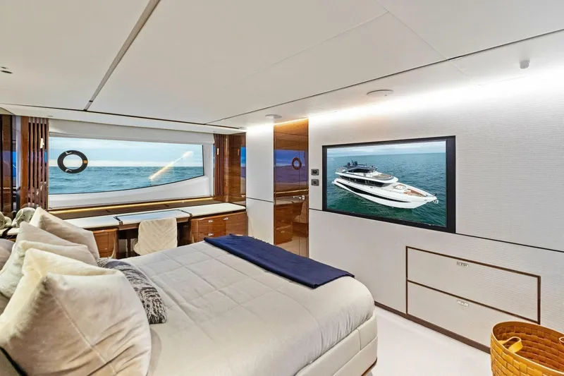 Slide: The Image of Luxurious 2024 Princess X80 yacht bedroom with ocean view and modern decor. - 38