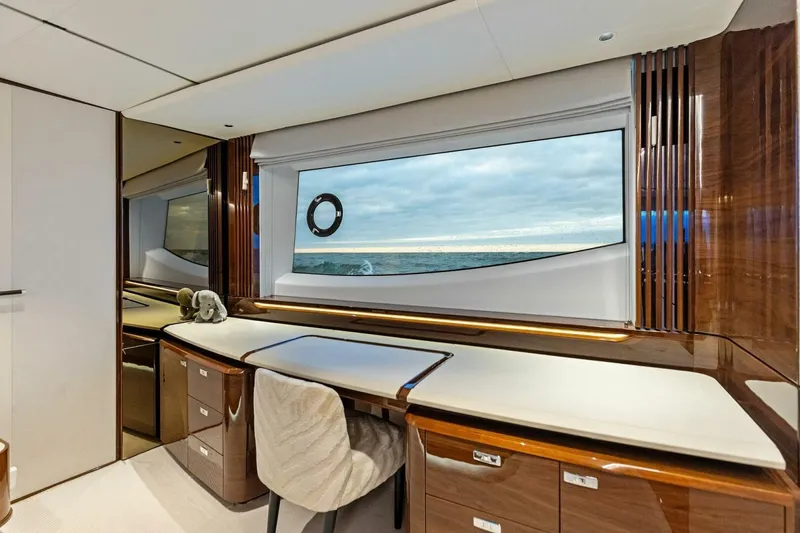 Slide: The Image of Luxurious interior of 2024 Princess X80 yacht with ocean view through large window. - 39