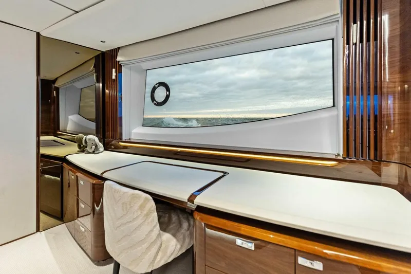 Slide: The Image of Luxurious interior of 2024 Princess X80 yacht with ocean view through large window. - 40