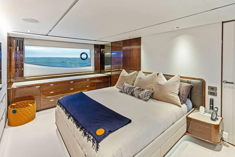 Slide: The Image of Luxurious 2024 Princess X80 yacht bedroom with ocean view and elegant decor. - 41