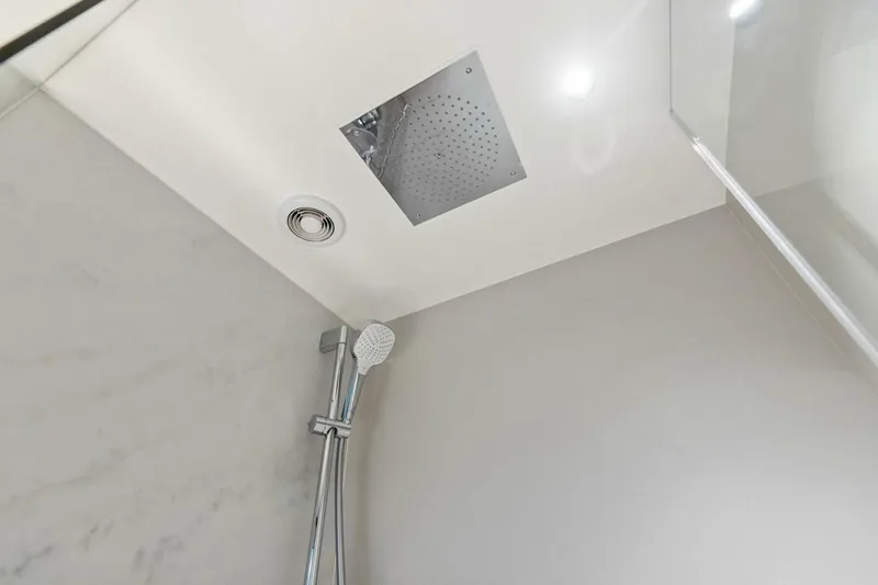 Slide: The Image of Modern shower with square rain showerhead in 2024 Princess X80 yacht bathroom. - 49
