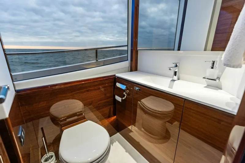 Slide: The Image of Luxurious bathroom in 2024 Princess X80 yacht with ocean view and modern fixtures. - 51