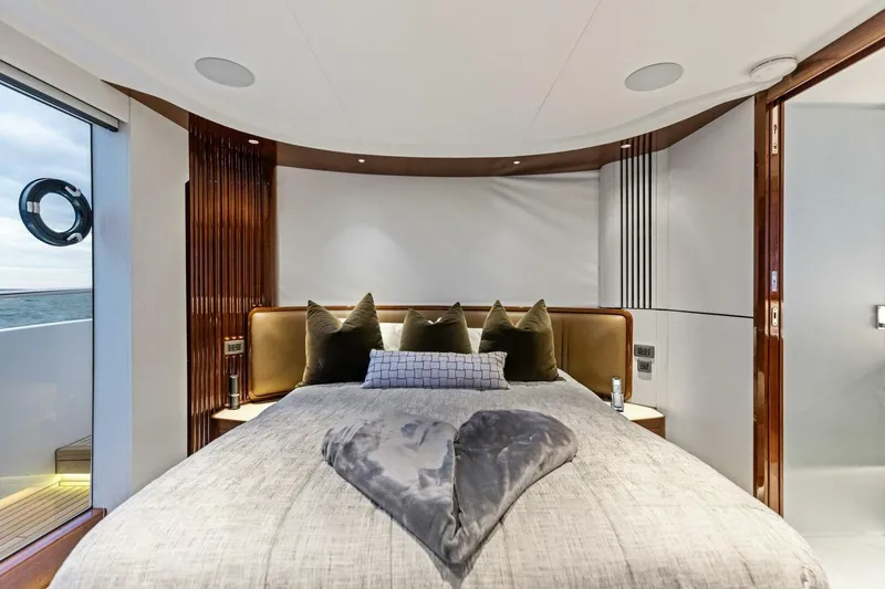 Slide: The Image of Luxurious 2024 Princess X80 yacht bedroom with elegant decor and ocean view. - 52