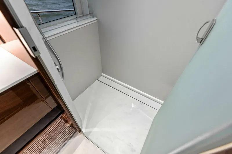 Slide: The Image of 2024 Princess X80 yacht interior shower area with modern design and sleek finishes. - 56