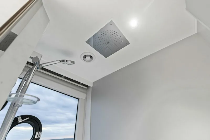 Slide: The Image of Modern shower area in 2024 Princess X80 yacht with sleek fixtures and ceiling light. - 57