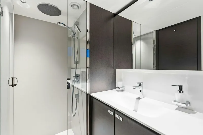 Slide: The Image of Luxurious bathroom in 2024 Princess X80 yacht with modern fixtures and sleek design. - 67