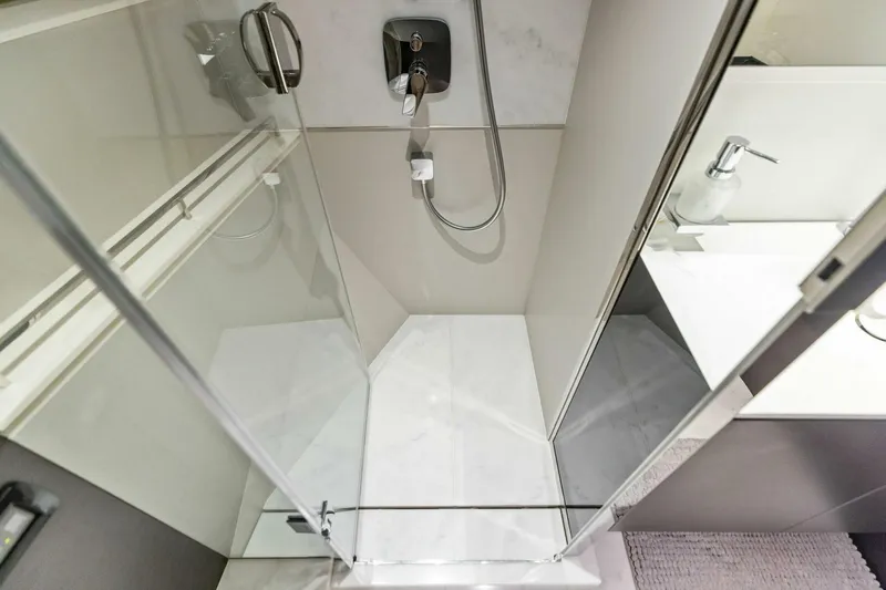 Slide: The Image of Modern shower area in 2024 Princess X80 yacht bathroom, featuring sleek glass doors. - 74