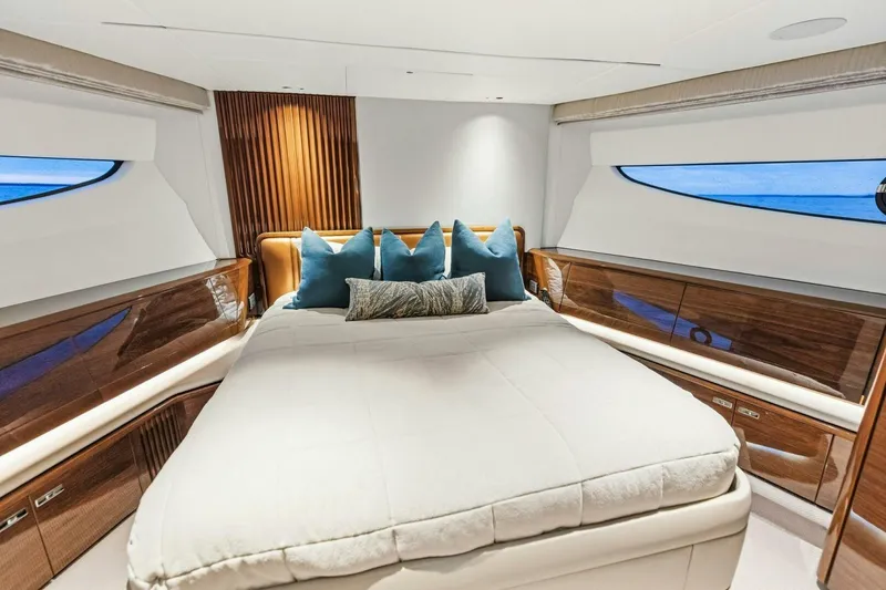 Slide: The Image of Luxurious bedroom interior of 2024 Princess X80 yacht with elegant wood finishes and ocean view. - 75