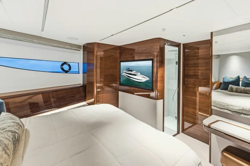 Slide: The Image of Luxurious interior of 2024 Princess X80 yacht with elegant wood finishes and modern amenities. - 77