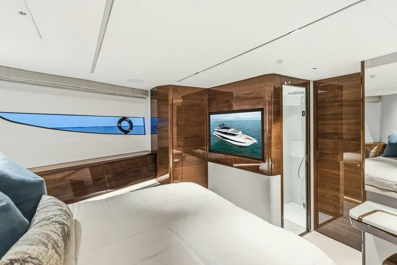 Slide: The Image of Luxurious 2024 Princess X80 yacht interior with elegant wood finishes and modern amenities. - 78