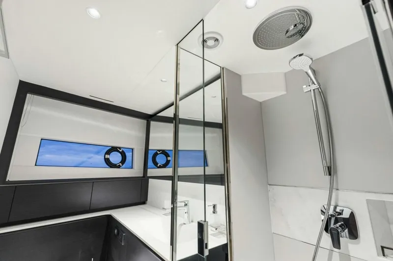 Slide: The Image of Luxurious bathroom interior of 2024 Princess X80 yacht with modern fixtures and ocean view. - 79