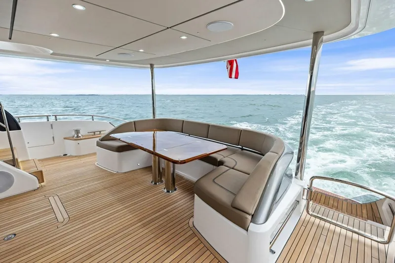 Slide: The Image of Luxurious 2024 Princess X80 yacht deck with elegant seating and ocean view. - 88