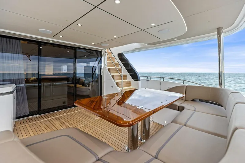 Slide: The Image of Luxurious 2024 Princess X80 yacht deck with elegant seating and ocean view. - 96