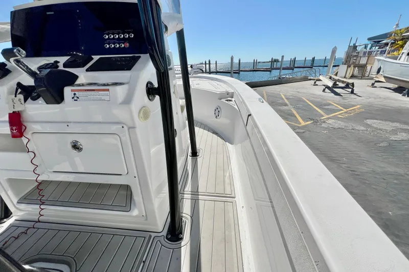 Slide: The Image of 2016 Sportsman Masters 247 Bay Boat interior with seating and fishing deck. - 17
