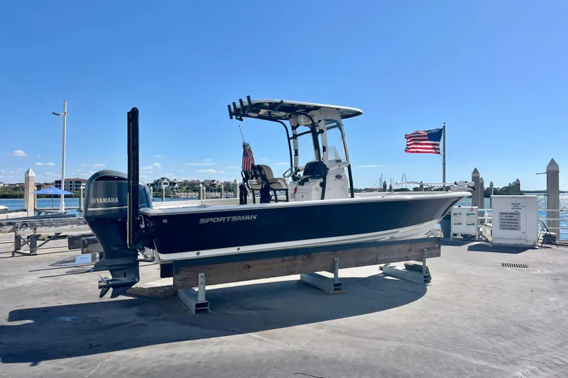 Slide: The Image of 2016 Sportsman Masters 247 Bay Boat with Yamaha engine on dock. - 6