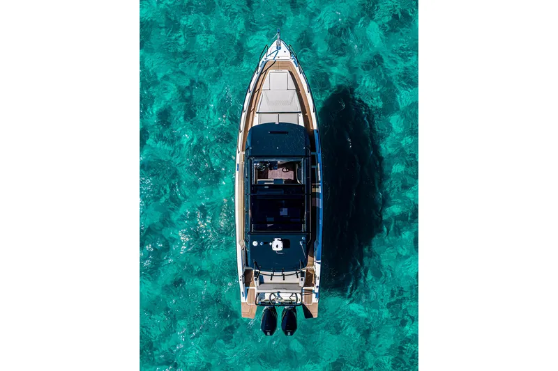 Slide: The Image of Aerial view of 2026 Navan S30 boat on clear turquoise water. - 11