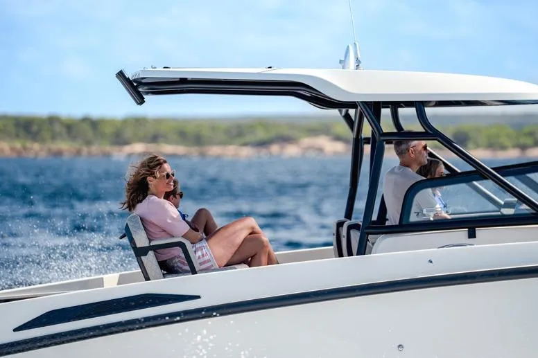 Slide: The Image of 2026 Navan S30 boat cruising with passengers enjoying the ocean view. - 9