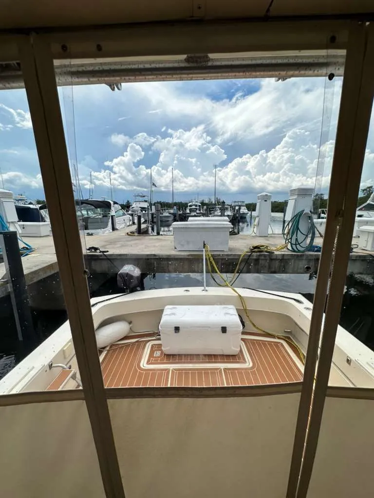 Slide: The Image of View from 1988 Atlantic 34 Express boat at marina. - 11