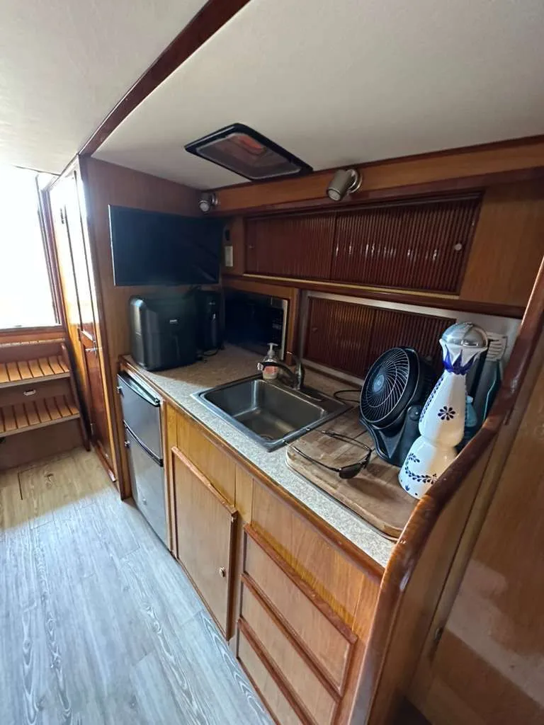 Slide: The Image of Galley area of 1988 Atlantic 34 Express yacht. - 18
