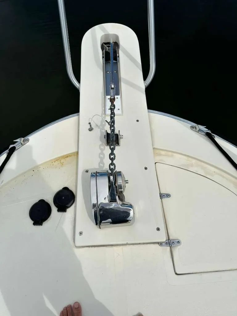 Slide: The Image of Bow of a 1988 Atlantic 34 Express boat with anchor windlass. - 29