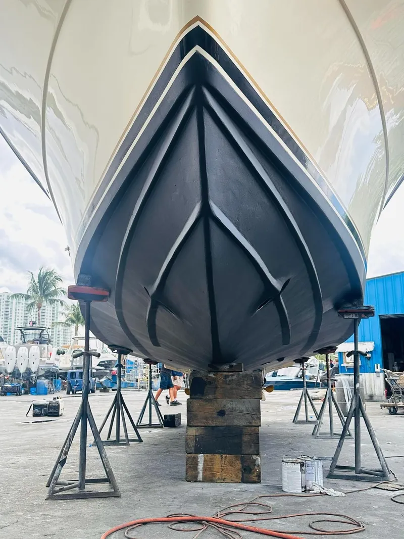 Slide: The Image of 1988 Atlantic 34 Express yacht in dry dock, underside view. - 34