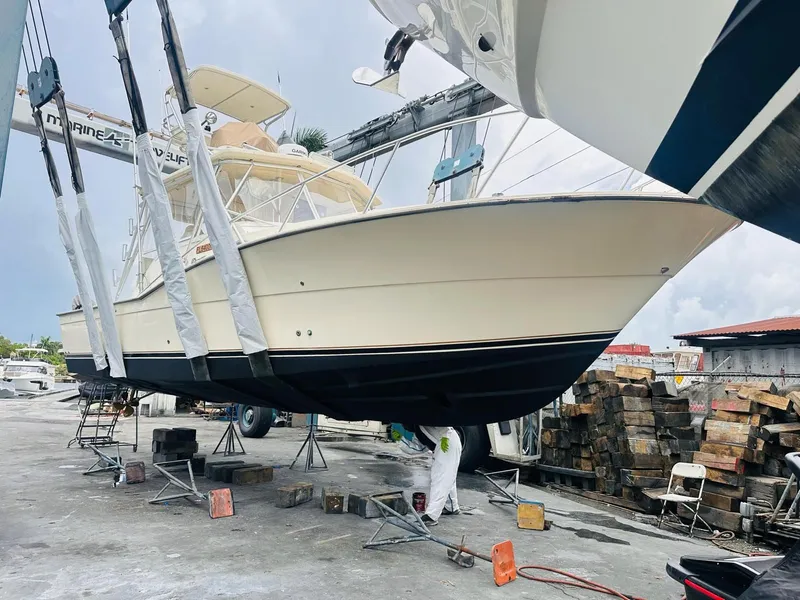 Slide: The Image of 1988 Atlantic 34 Express boat in a shipyard. - 35