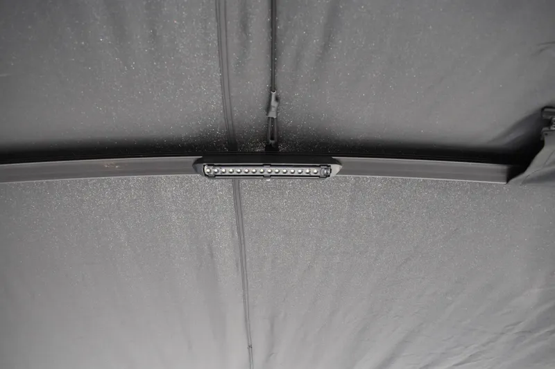 Slide: The Image of LED light bar on 2026 Lowe SS 230 WT boat's interior ceiling. - 49
