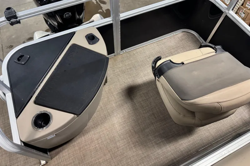 Slide: The Image of Interior of 2022 Sun Tracker Bass Buggy 18 DLX with seating and console. - 16