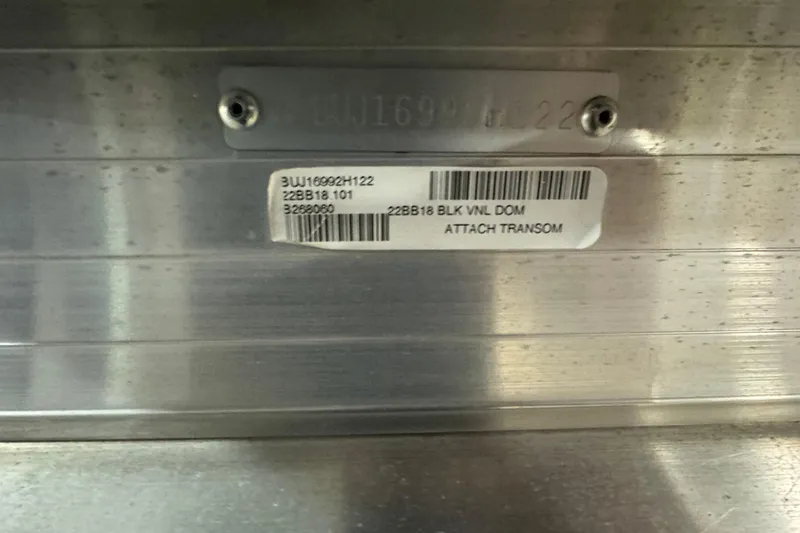 Slide: The Image of 2022 Sun Tracker Bass Buggy 18 DLX identification plate with barcode and serial number. - 6
