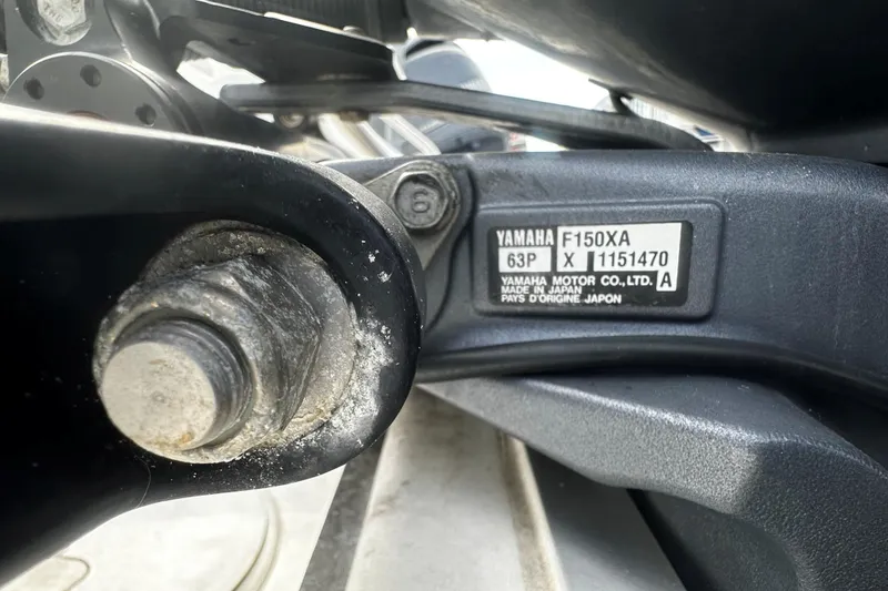 Slide: The Image of Close-up of Yamaha F150XA engine part on 2015 Sea Hunt Ultra 211 boat. - 10