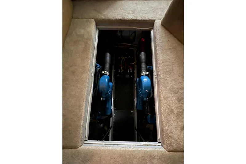 Slide: The Image of Engine compartment of a 2005 Silverton 34 Convertible boat, showcasing dual engines. - 40