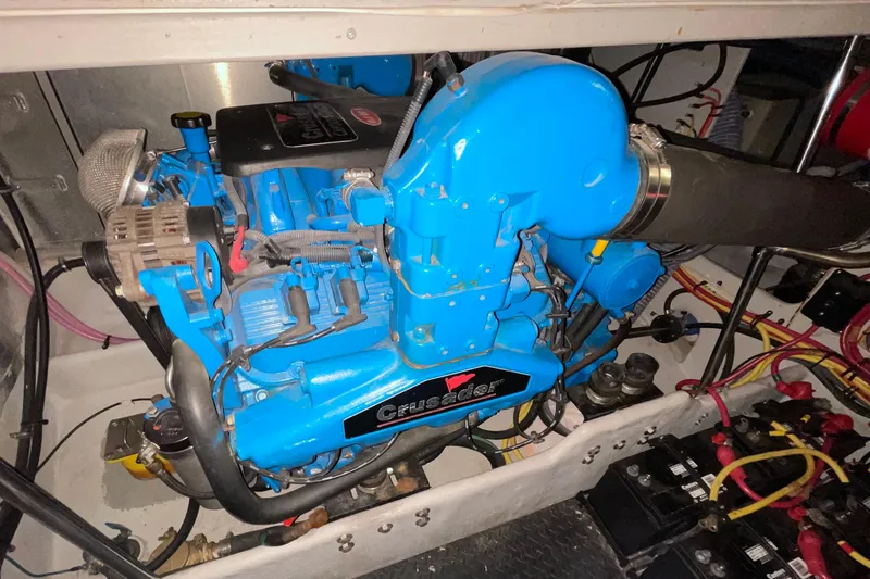 Slide: The Image of Engine compartment of a 2005 Silverton 34 Convertible with a blue Crusader engine. - 43