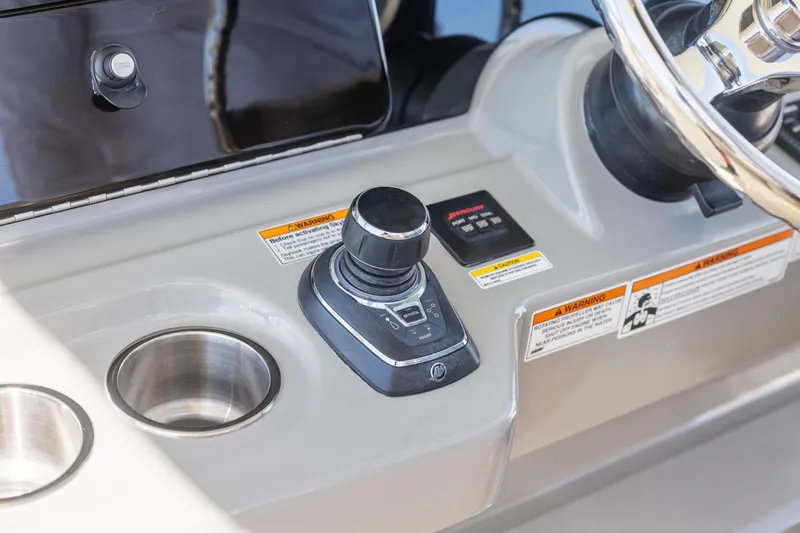 Slide: The Image of Control panel of 2017 Boston Whaler 350 Outrage with joystick and cup holder. - 31