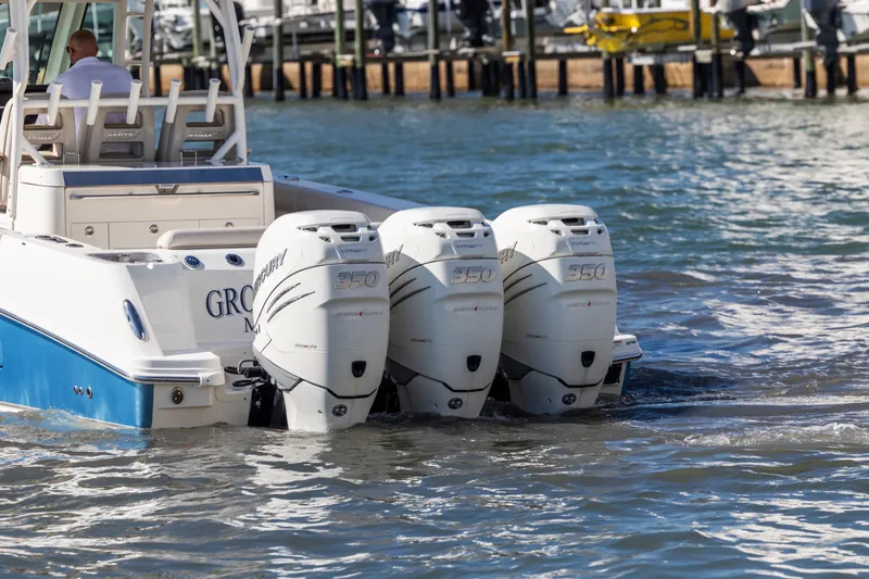 Slide: The Image of 2017 Boston Whaler 350 Outrage with triple Mercury engines on the water. - 45