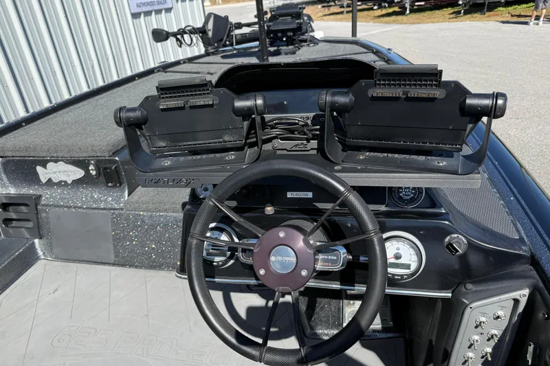 Slide: The Image of 2020 Blazer 625 Pro Elite boat dashboard with steering wheel and instrument panel. - 12
