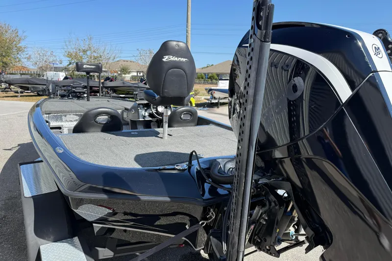 Slide: The Image of 2020 Blazer 625 Pro Elite boat with sleek design and modern features. - 9