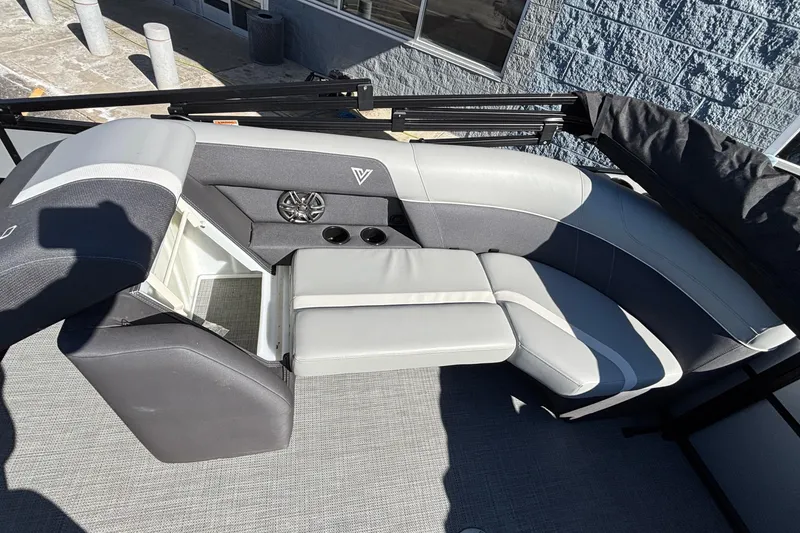 Slide: The Image of Luxurious seating on 2026 Viaggio X24U boat with cup holders and speaker system. - 16